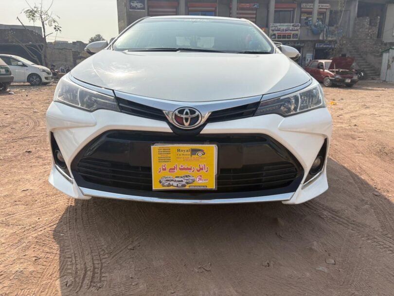 Toyota Corolla luxury car rental in Islamabad by Royal Rent a Car with professional driver.